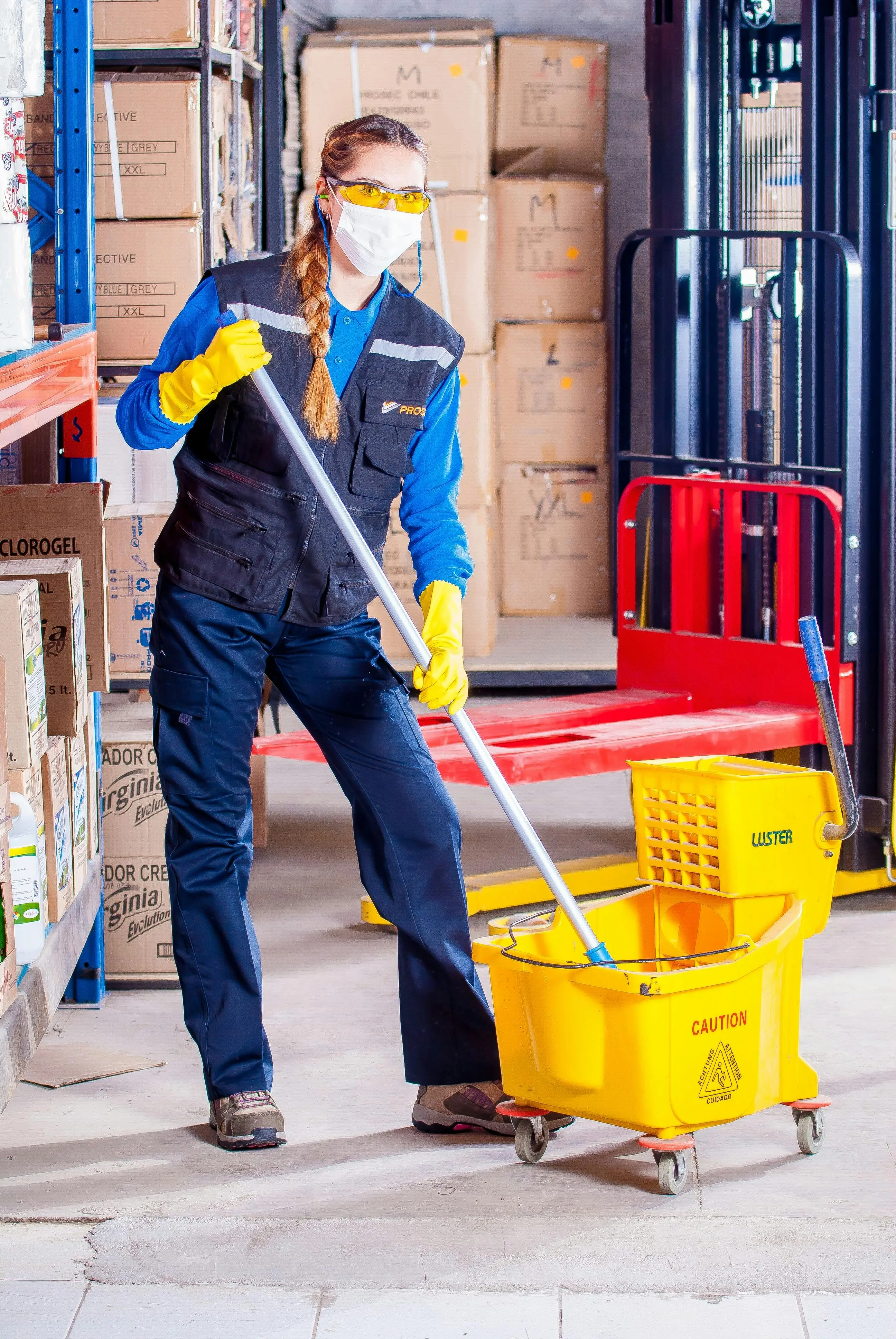 Janitorial staff with cleaning cart